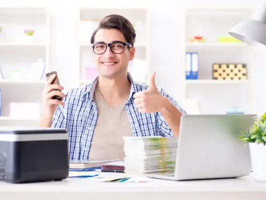 a guy with thumbs up in sign of approval